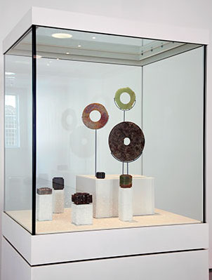 Installation view of Indifferent Matter, Collection of jade bi and cong, Courtesy of the Museum of East Asian Art, Bath and the Oriental Museum, Durham Photo: Jerry Hardman-Jones; Henry Moore Institute